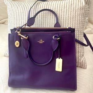 Coach purple satchel.
